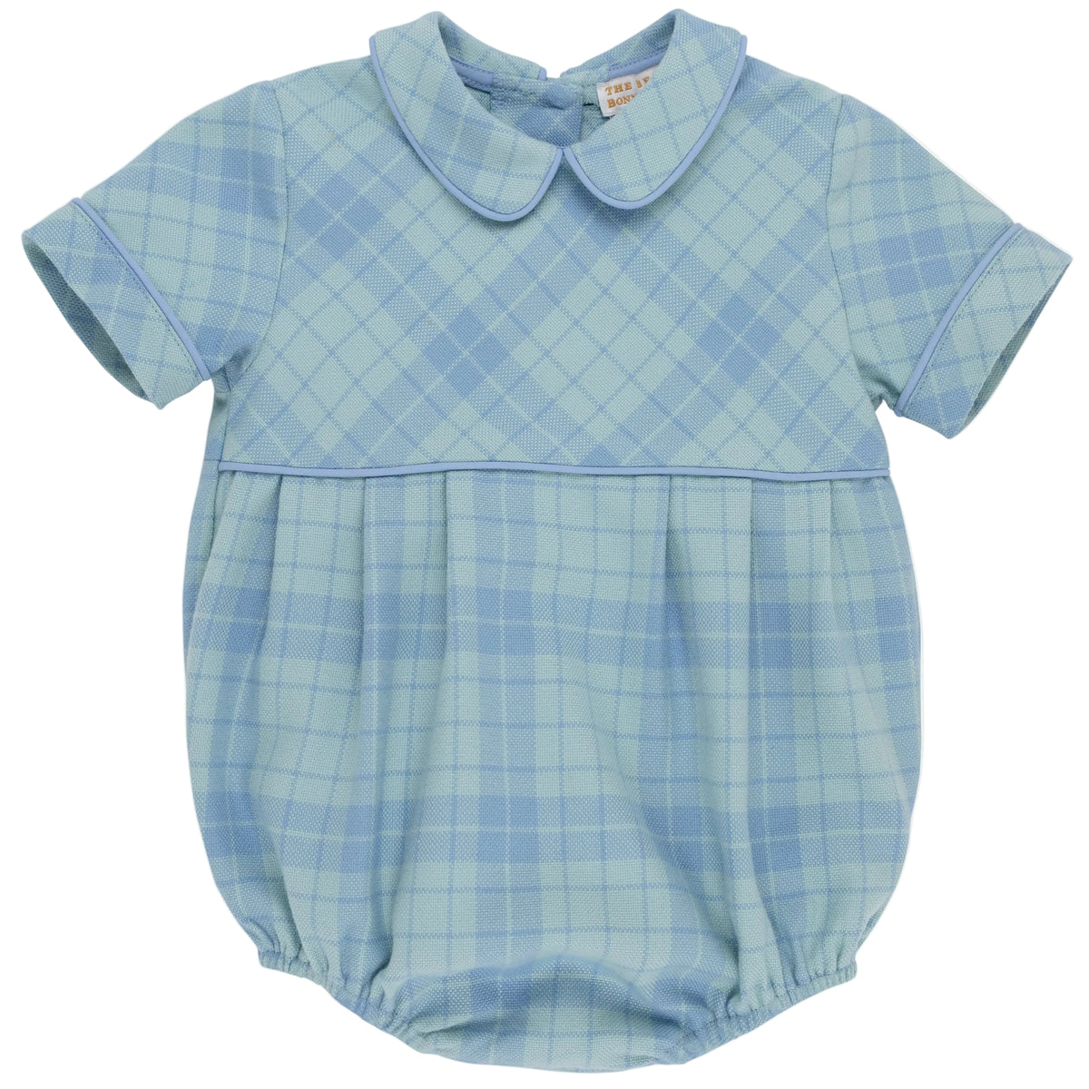 The Beaufort Bonnet Company Baby Boys’ Bradford Bubble is a light blue, short-sleeve romper featuring a Peter Pan collar and blue plaid pattern. This charming piece includes delicate piping details and an elasticized bottom for a timeless look inspired by classic style.