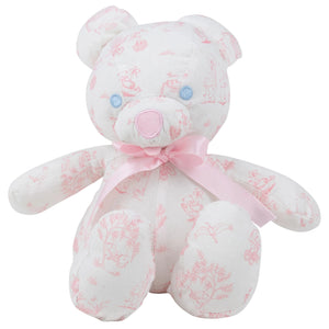 A white and pink patterned teddy bear with blue button eyes and a pink ribbon bow around its neck sits upright against a plain background. The Bradley Bear - Sir Propers Sweet Arrival by The Beaufort Bonnet Company makes an adorable baby shower gift.