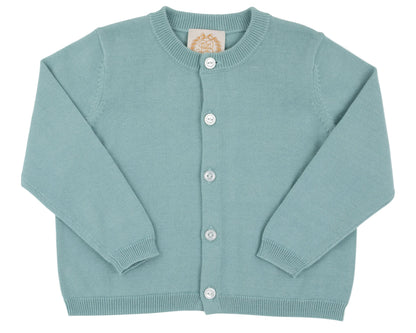 The Baby Girls’ and Girls’ Cambridge Cardigan by The Beaufort Bonnet Company is shown in light blue, featuring pearlized white buttons. Displayed flat against a white background, the cardigan has long sleeves and a round neckline.