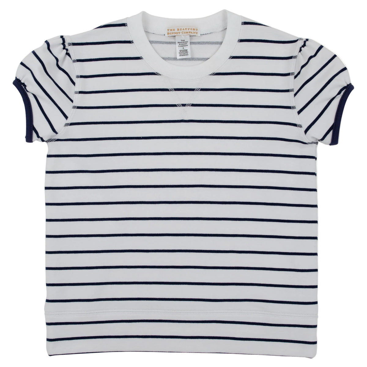 Girls’ Cassidy Comfy Crewneck Puff Sleeve by The Beaufort Bonnet Company, featuring short sleeves, a white base with navy horizontal stripes, and ribbed crew neck and cuffs. This classic style shirt is displayed laid flat on a plain white background.