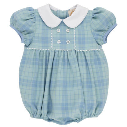 Baby Girls’ Cindy Lou Bubble by The Beaufort Bonnet Company in Audubon Park Plaid, featuring light blue and green plaid, puffed short sleeves, a white collar, decorative buttons, and scalloped trim on the chest.