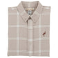 A beige Boys’ Flannel Dean’s List Dress Shirt from The Beaufort Bonnet Company with a pelican logo on the chest, neatly folded with the collar and buttons visible.