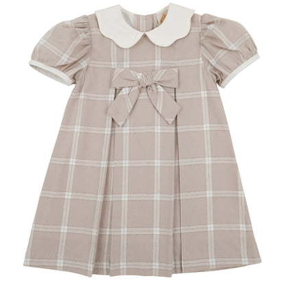 The Beaufort Bonnet Company’s Baby Girls’ and Girls’ Francene Frock is a charming, short-sleeved beige Thompson Park Plaid dress featuring a white Peter Pan collar, front bow detail, and pleated skirt—perfectly designed for young children.