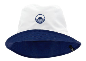 The Feather 4 Arrow Suns Out Reversible Bucket Hat is an ideal choice for the beach, featuring a white design with a navy brim and an embroidered wave logo. It includes an adjustable chin strap to stay secure on breezy days.