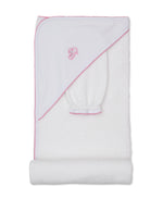 The Kissy Kissy Sweet Sheep Hooded Towel with Mitt features a white Pima cotton towel set trimmed in pink, with an embroidered sheep design on the hood. Displayed folded against a white background, the set includes a matching mitt—perfect for a gentle baby bath.
