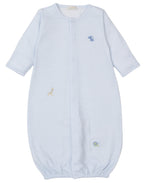 The Kissy Kissy Baby Jungle Mates Hand Emb. Striped Conv Gown is a light blue, long-sleeve sleep sack crafted from soft Pima cotton, featuring adorable embroidered animals like an elephant, giraffe, and lion on a Jungle Mates stripe print. It includes an elastic bottom hem for comfort.