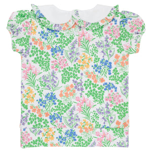 Girls’ Short Puff Sleeve Maude’s Cassidy Comfy Crewneck from The Beaufort Bonnet Company, featuring a white Peter Pan collar and a vibrant floral print with green, blue, pink, orange, and purple flowers on a white background—part of the Gaston Street Garden collection.