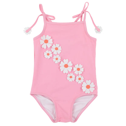 The Beaufort Bonnet Company’s Baby Girls’ and Girls’ St. Lucia Swimsuit in pink features white daisy appliques arranged in a diagonal line along the front, with additional daisy accents adorning the shoulder straps. This delightful one-piece combines playful details with timeless style, making it perfect for sunny days by the water.