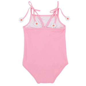 The Beaufort Bonnet Company Baby Girls’ and Girls’ St. Lucia Swimsuit features a light pink one-piece design with charming shoulder ties, daisy flower appliques on the front, and a white chest lining—perfectly styled in classic Beaufort Bonnet fashion.