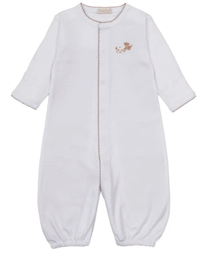 The Kissy Kissy Baby Premier Puppy Paws Hand Emb. Convertible Gown is a white infant one-piece sleep suit made from ultra-soft Pima cotton, featuring long sleeves, elastic cuffs, delicate brown stitching accents, and a small hand-embroidered puppy paw design on the chest. This cozy convertible gown offers both comfort and versatility for your little one.