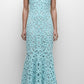 A woman wears the Simkhai Clairis Lace Bustier Midi Dress with a flared hem and open-toe sandals, standing against a plain white background.