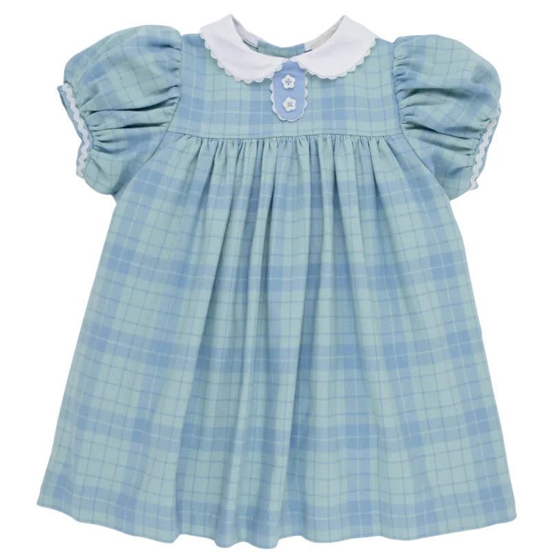 The Beaufort Bonnet Company’s Baby Girls’ and Girls’ Mary Dal Dress features the charming Audubon Park Plaid in light blue, with puffed short sleeves, a white scalloped collar, and two decorative flower buttons on the chest.