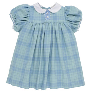 The Beaufort Bonnet Company’s Baby Girls’ and Girls’ Mary Dal Dress features the charming Audubon Park Plaid in light blue, with puffed short sleeves, a white scalloped collar, and two decorative flower buttons on the chest.