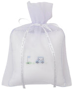 The Kissy Kissy Fairway Foursome Musical Pillow by Kissy Kissy features a white tulle bag, adorned with a sheer ribbon and an embroidered design of a golf cart and flag on green.