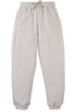 The Boys’ Alessio French Terry Jogger Pants from Gingersnaps, shown in light gray and laid flat on a white background, feature an elastic waistband with a drawstring, side pockets, and ribbed cuffs—ideal for boys looking for comfortable everyday joggers.