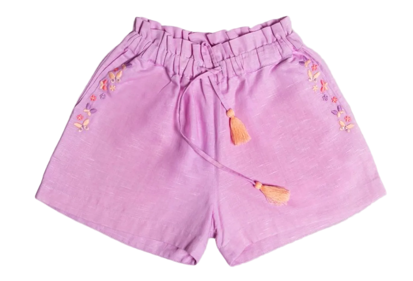The Early Sunday Girls’ Roman Shorts, shown in light purple on a white background, feature an elastic waistband with a tassel drawstring and delicate embroidered floral accents along the sides. These comfortable cotton linen shorts are designed with a relaxed fit for all-day wear.