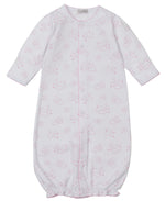 The Kissy Kissy Baby Cheerful Goodnight Convertible Gown features long sleeves, a pink cloud and sun print, front snap closure, and an elastic hem. Made from ultra-soft Pima cotton for baby's comfort.
