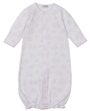 The Kissy Kissy Baby Cheerful Goodnight Convertible Gown features long sleeves, a pink cloud and sun print, front snap closure, and an elastic hem. Made from ultra-soft Pima cotton for baby's comfort.