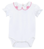 Dress your little one in the Tartine et Chocolat Baby Girls’ Peter Pan Collared Onesie—a white cotton romper featuring a charming scalloped Peter Pan collar with pink trim, delicate embroidered pink flowers, and short puff sleeves. Perfect as a summer outfit for baby girls, it also includes convenient snap buttons at the bottom and back for easy changes.