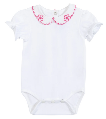 Dress your little one in the Tartine et Chocolat Baby Girls’ Peter Pan Collared Onesie—a white cotton romper featuring a charming scalloped Peter Pan collar with pink trim, delicate embroidered pink flowers, and short puff sleeves. Perfect as a summer outfit for baby girls, it also includes convenient snap buttons at the bottom and back for easy changes.