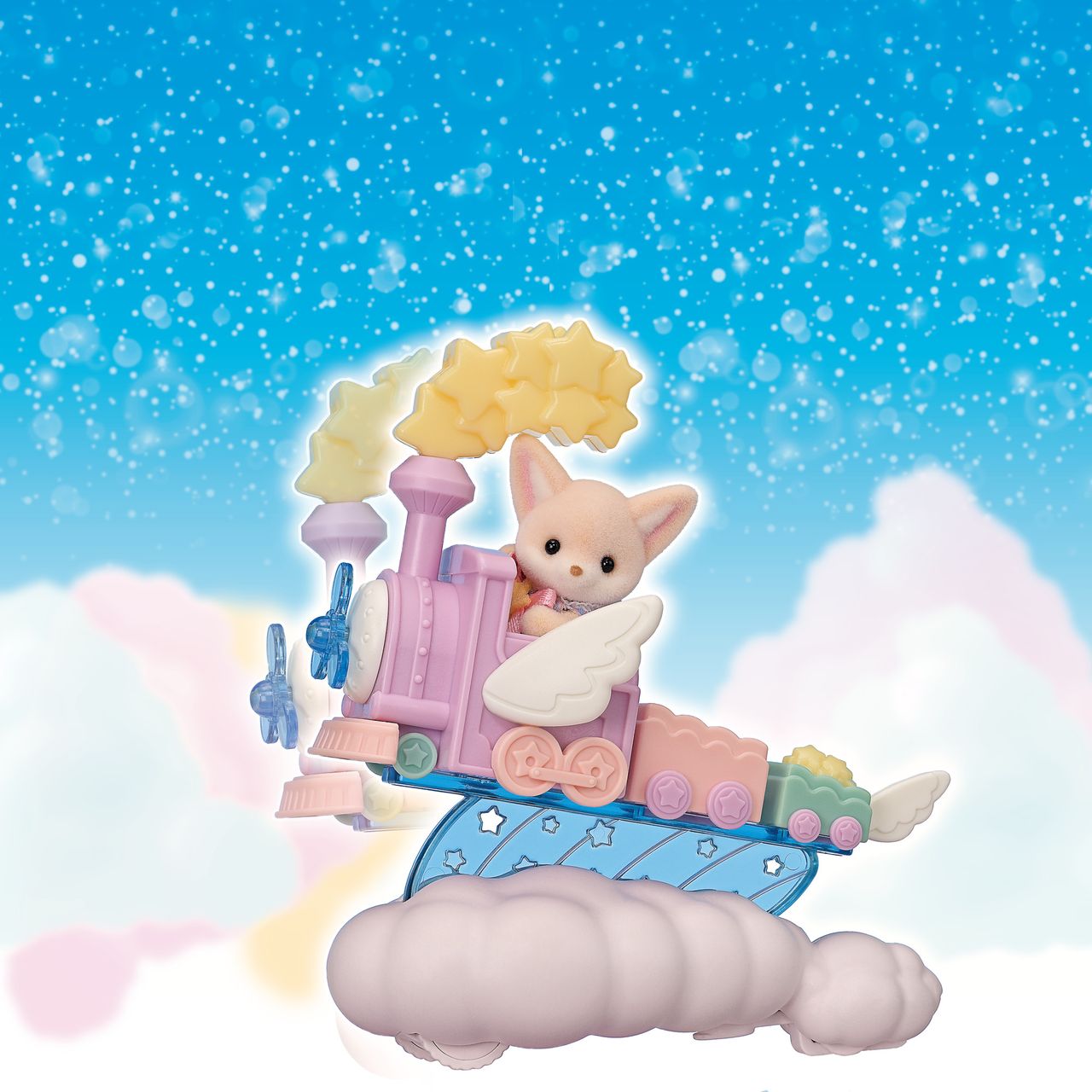 A Calico Critters figurine rides the pastel-colored Daydream Parade Playset—a whimsical toy train with wings and clouds—set against a background of stars and fluffy clouds.