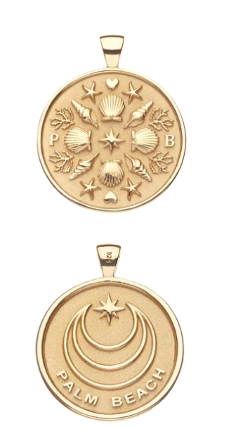 The Jane Win Destination Pendant Necklace Collection includes two round pendants: one with shells, stars, and "P B," the other with moons, a star, and "PALM BEACH"—ideal for layering or wearing alone.