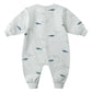 The Quincy Mae Baby Boys' Relaxed Fleece Jumpsuit is a light grey, long-sleeve fall outfit with cuffs, easy-change snaps, and a cute blue and outline-drawn narwhal pattern.