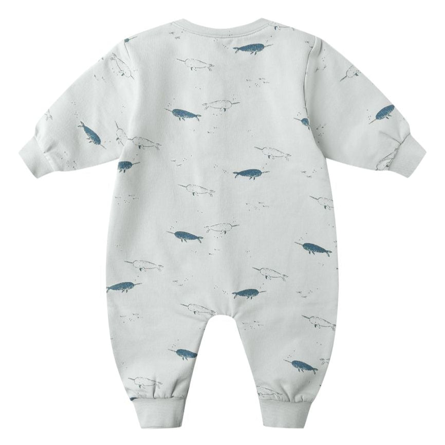 The Quincy Mae Baby Boys' Relaxed Fleece Jumpsuit is a light grey, long-sleeve fall outfit with cuffs, easy-change snaps, and a cute blue and outline-drawn narwhal pattern.