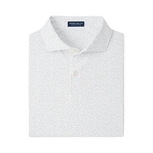 The Fermata Performance Jersey Polo by Peter Millar is a white collared shirt with a subtle blue dotted pattern, two buttons, and four-way stretch for comfort. "Peter Millar" is featured on the inside collar tag.
