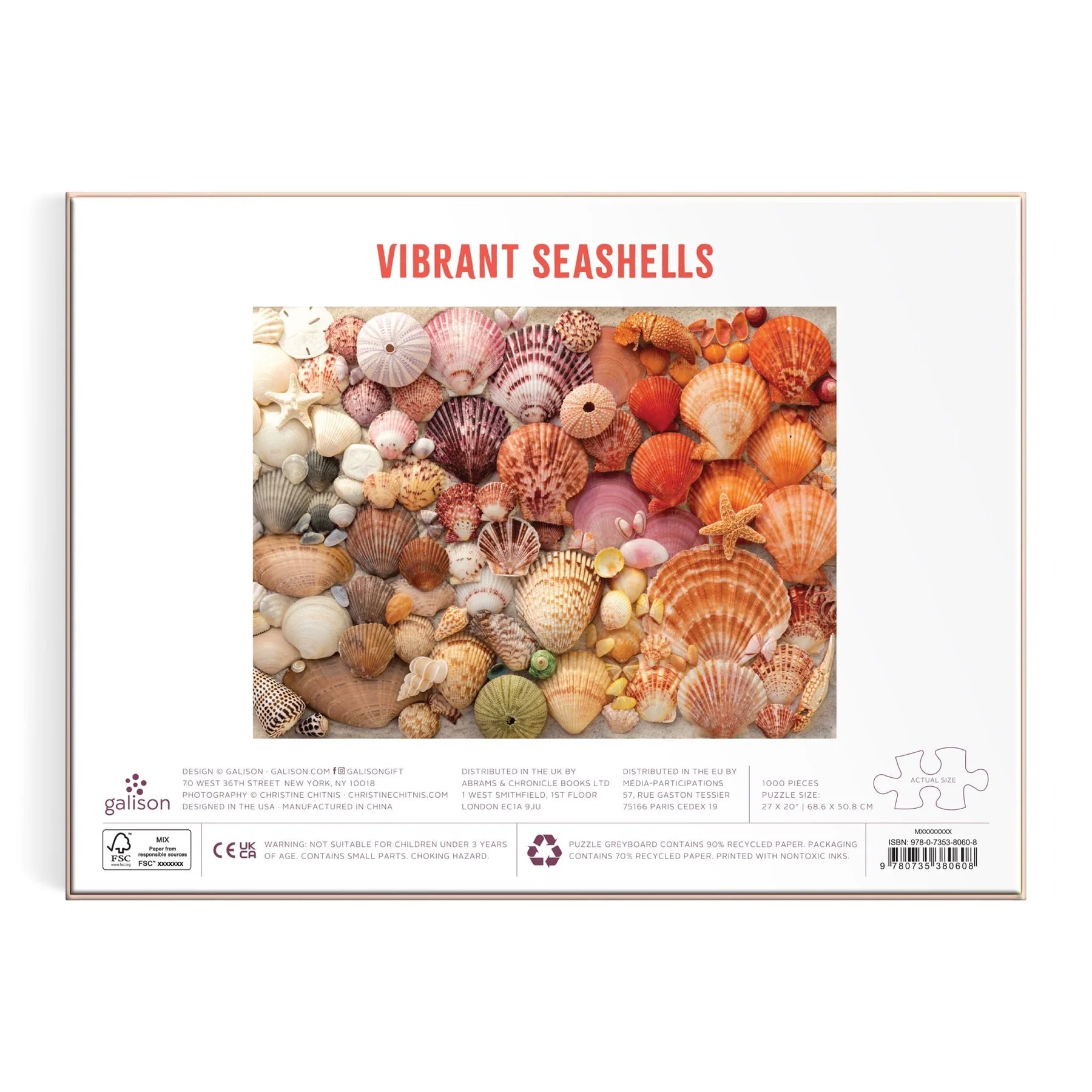 The Mudpuppy Vibrant Seashells Puzzle features a vivid display of colorful seashells clustered together on the box’s front, inviting puzzlers to enjoy assembling this delightful 1000-piece puzzle made from recycled materials.