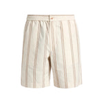 The Cove Stripe Short by Vince features beige fabric with vertical brown double stripes, an elastic waistband, button closure, and side pockets—displayed on a white background. These vacation-ready shorts are designed for all-day comfort.