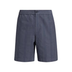 The Cove Stripe Short by vince features a dark grey double-stripe design, a button closure, faux fly, and an elastic waistband with vertical stripe detailing—making it the perfect choice for vacation-ready comfort and effortless style.