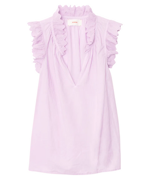 The Bexie Top by Xirena is a sleeveless light purple popover with a deep V-neckline and ruffled collar, crafted from lightweight fabric for an airy feel.