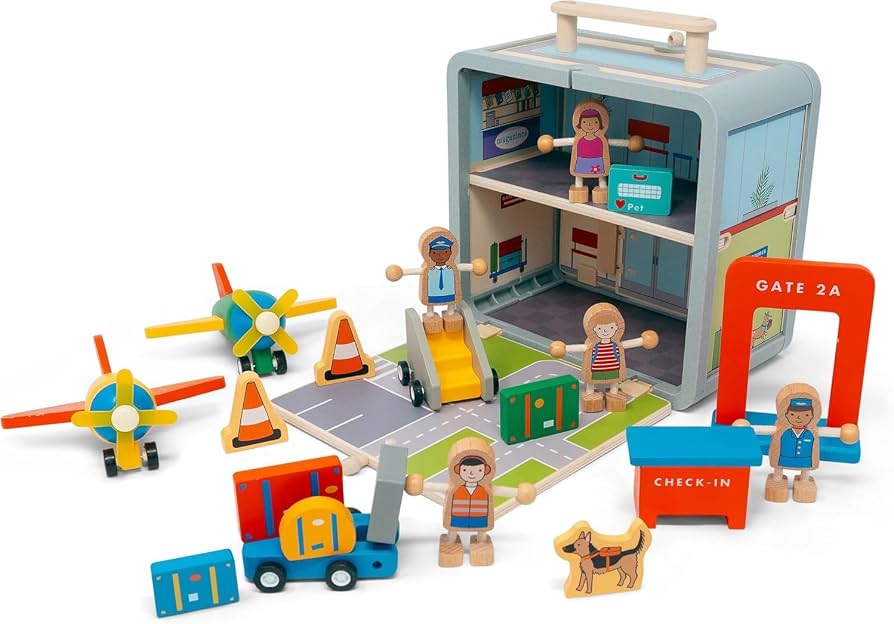 Jack Rabbit Creations Suitcase Series wooden toy airport featuring an eco-friendly bamboo suitcase that opens into a terminal, model airplanes, vehicles, and wooden figures of people and a dog.