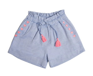 Introducing the Early Sunday Girls’ Roman Shorts – light blue cotton linen shorts designed for kids, featuring an elastic waistband, a drawstring with playful tassels, and charming small pink heart accents along the side pockets. Crafted for breathability and everyday comfort, these stylish shorts are perfect for any occasion.