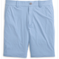 The Fusionn Short by Johnnie-O is a light blue, knee-length performance short in a classic chino style, crafted from comfortable stretch-knit fabric. It features a button closure, belt loops, and two front pockets, and is displayed against a white background.