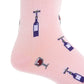 Close-up of the Dapper Classics Merlot Mid Calf Socks in pink, made from mercerized cotton, showcasing a pattern with wine bottles, corkscrews, and wine glasses. These socks are designed for a stylish and comfortable mid-calf fit.