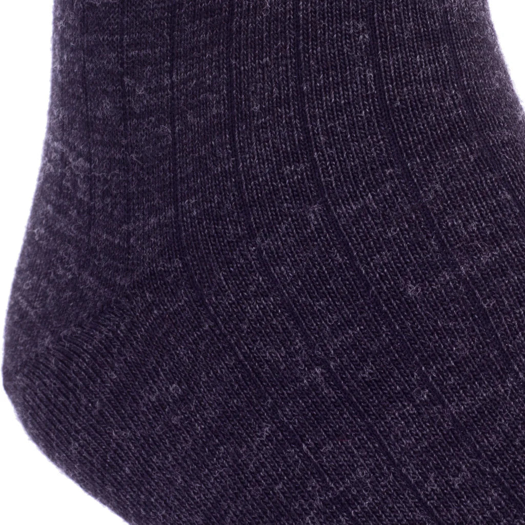 Close-up of the Dapper Classics Charcoal Solid Ribbed Fine Merino Wool Sock, featuring its ribbed texture and knit detail. This men’s mid-calf dress sock with linked toe is crafted in North Carolina.