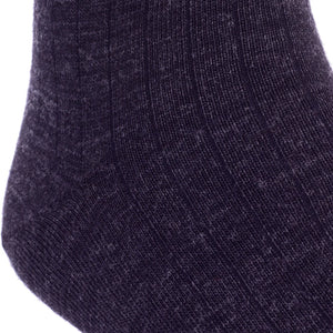 Close-up of the Dapper Classics Charcoal Solid Ribbed Fine Merino Wool Sock, featuring its ribbed texture and knit detail. This men’s mid-calf dress sock with linked toe is crafted in North Carolina.