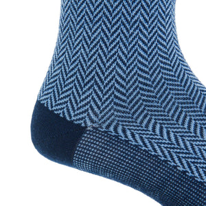 Close-up of the Dapper Classics Dress Navy and Sky Blue Herringbone Fine Merino Wool Sock, showcasing a herringbone pattern and solid toe—ideal for patterned sock enthusiasts.