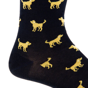 A close-up of the Dapper Classics Navy with Yolk Dog Cotton Sock, a stylish mid-calf sock with repeating yellow dog silhouettes and a comfortable linked toe design.