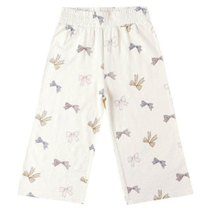 Rylee & Cru Baby Girls’ and Girls’ Wide Leg Pant—white cotton pull-on pants with an elastic waistband and pastel scattered bow print.