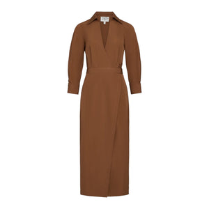 The Walkaway Cotton Poplin Dress by TWP is a brown, long-sleeve, collared midi dress with a V-neckline, wrap waist, belted detail, and crafted from a cotton-blend fabric for effortless style.