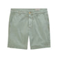 AG Jeans Wanderer Shorts in light green, expertly crafted from premium Italian fabric, feature a tailored silhouette with front pockets, button closure, and belt loops. Displayed on a white background.