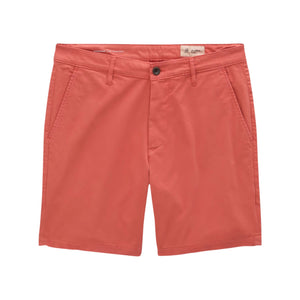 Wanderer Shorts by AG Jeans in a coral hue, expertly crafted from premium Italian fabric with front pockets, belt loops, and a button closure for a tailored finish, displayed flat on a white background.