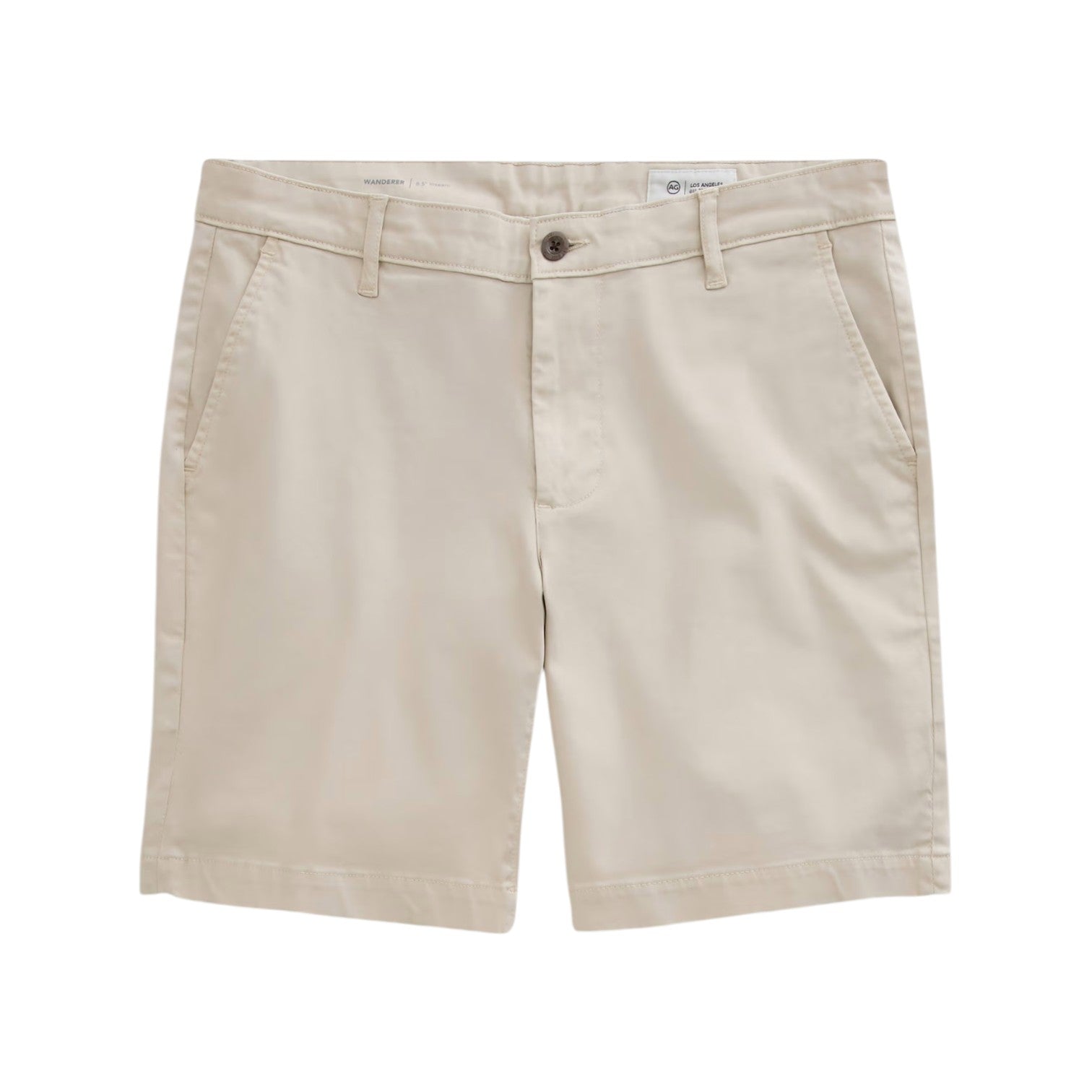 The Wanderer Shorts by AG Jeans are beige, slim, trouser-style shorts crafted from premium Italian fabric. They feature belt loops, side pockets, and a button closure for a refined, tailored look—displayed flat on a white background.