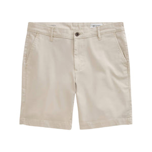 The Wanderer Shorts by AG Jeans are beige, slim, trouser-style shorts crafted from premium Italian fabric. They feature belt loops, side pockets, and a button closure for a refined, tailored look—displayed flat on a white background.