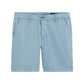 The Wanderer Shorts by AG Jeans are men’s chino shorts in light blue, expertly crafted from fine Italian fabric. They feature a slim, trouser-style design with front pockets, belt loops, a button closure, and a zipper fly—delivering a tailored look against a crisp white background.