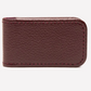 The Ettinger Capra Magnetic Cash Clip, crafted from rectangular brown goat leather with visible edge stitching, is displayed against a plain white background.