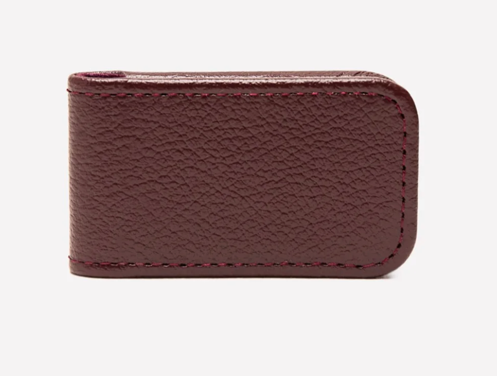 The Ettinger Capra Magnetic Cash Clip, crafted from rectangular brown goat leather with visible edge stitching, is displayed against a plain white background.